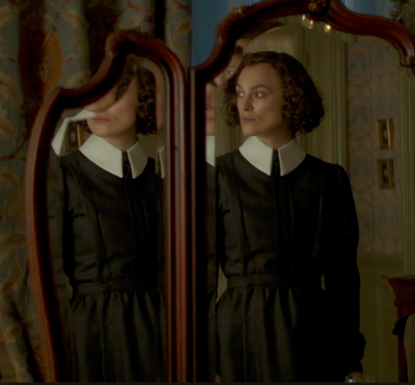 Keira Knightley as Colette in mirror wearing Claudine dress
