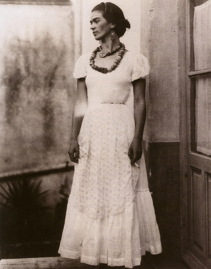 Frida Kahlo with cigarette and white dress 1929, Photographed by Guillermo Davila