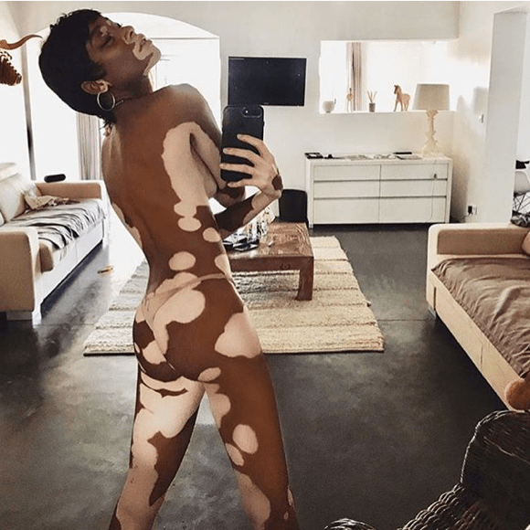Winnie Harlow posing nude for a selfie in a mirror